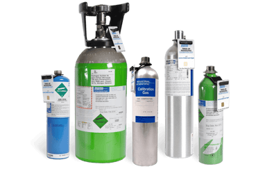 Image of five Industrial Scientific calibration gas cylinders.