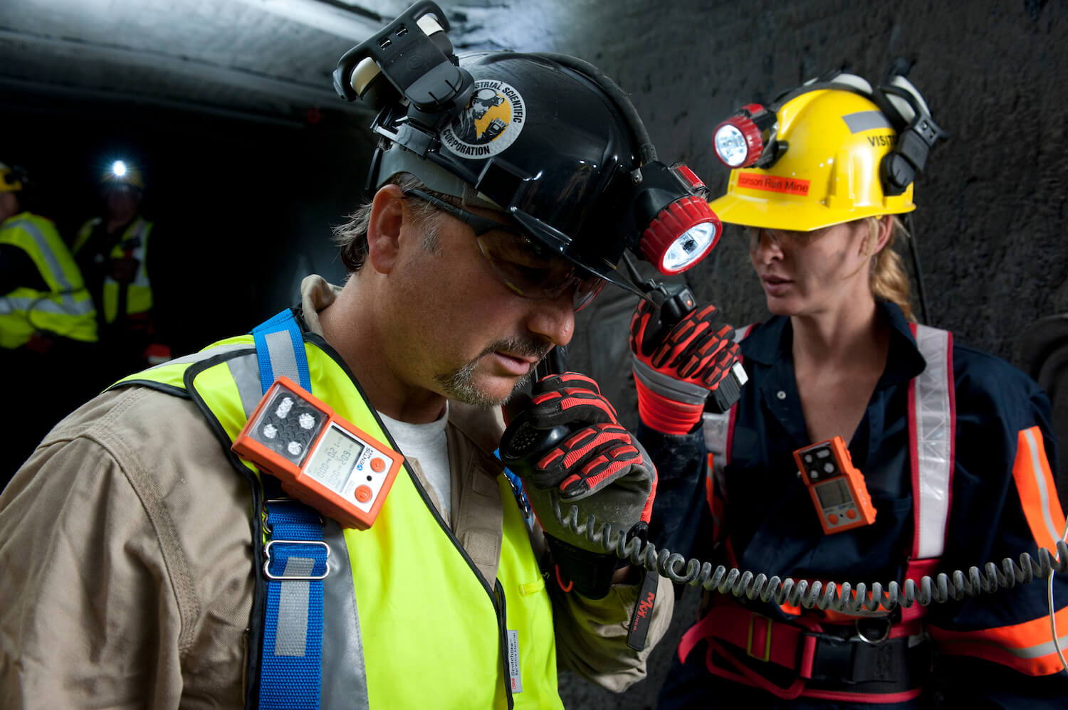 man woman talking gas detector