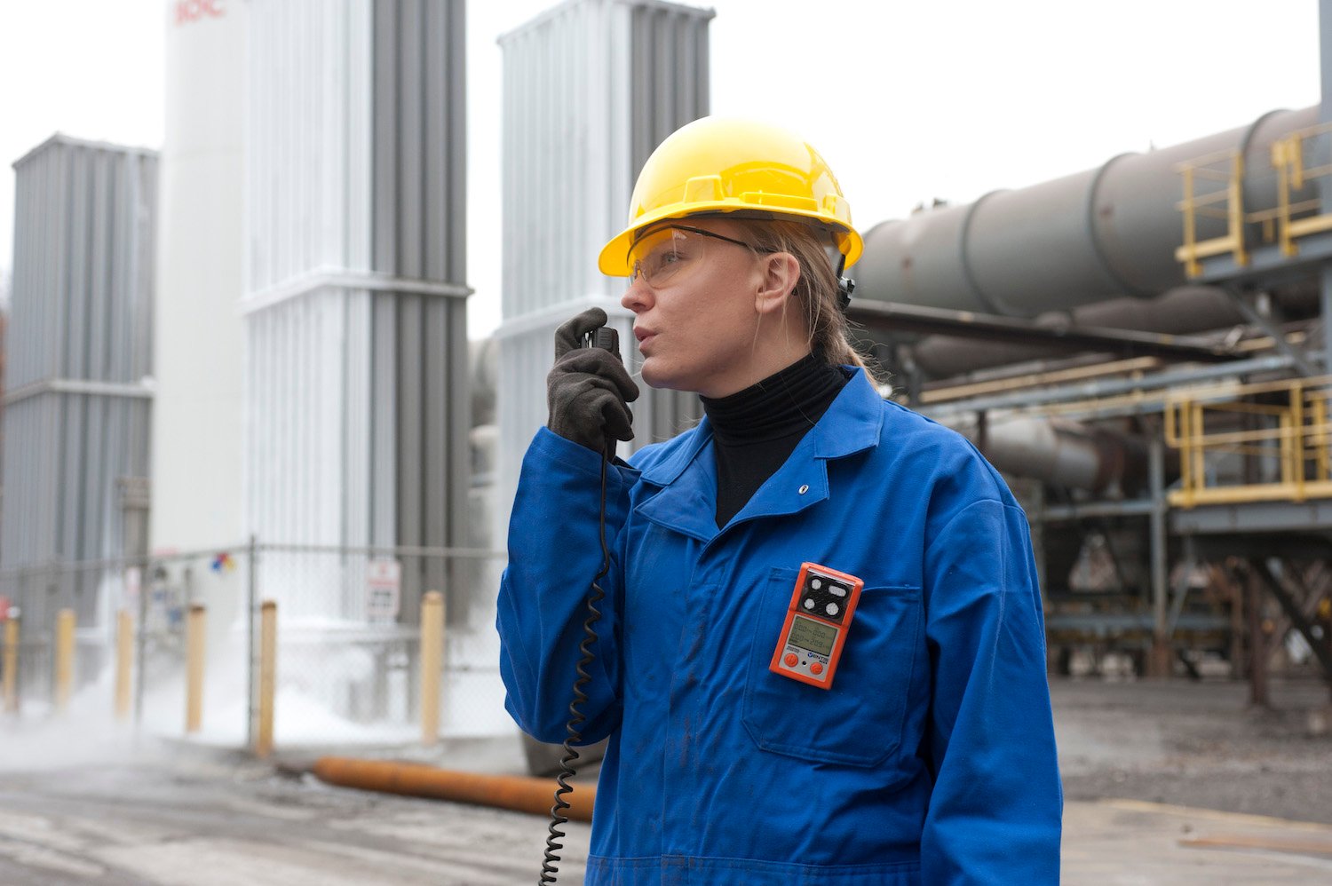 woman talking gas detector